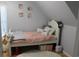 Charming bedroom with a white bed frame and pink bedding at 1409 Arbor Rd., Loris, SC 29569