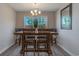 Bright dining room with a wooden table and chairs at 615 Snowy Owl Way, Conway, SC 29527