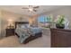 Spacious bedroom with large window and ceiling fan at 615 Snowy Owl Way, Conway, SC 29527