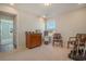 Spacious home office with two chairs and cabinet at 615 Snowy Owl Way, Conway, SC 29527