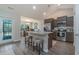 Modern kitchen with stainless steel appliances and an island at 615 Snowy Owl Way, Conway, SC 29527