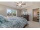 Comfortable bedroom with large window and a dresser at 615 Snowy Owl Way, Conway, SC 29527