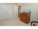 Well-lit office area with double doors and cabinet at 615 Snowy Owl Way, Conway, SC 29527