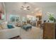 Open living room with vaulted ceiling and access to kitchen at 615 Snowy Owl Way, Conway, SC 29527