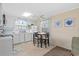 Efficient kitchen with modern appliances and breakfast nook at 6001-5137 S Kings Hwy., Myrtle Beach, SC 29575