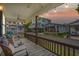 Relaxing porch with comfortable seating, overlooking the neighborhood at 6001-5137 S Kings Hwy., Myrtle Beach, SC 29575