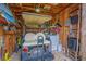Storage room with golf cart and washer at 6001-5137 S Kings Hwy., Myrtle Beach, SC 29575