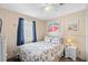 Bedroom with a queen bed, nightstand, and ceiling fan at 6001-5137 S Kings Hwy., Myrtle Beach, SC 29575