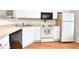 White kitchen with stainless steel appliances at 1065 Pinwheel Loop # 1065, Myrtle Beach, SC 29577