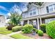 Two story home with landscaping and walkway at 1065 Pinwheel Loop # 1065, Myrtle Beach, SC 29577