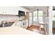 Small kitchen with white cabinets and appliances at 1065 Pinwheel Loop # 1065, Myrtle Beach, SC 29577