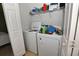 Convenient laundry room with washer, dryer, and overhead shelving at 1065 Pinwheel Loop # 1065, Myrtle Beach, SC 29577