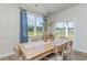 Bright dining room with large window and wood table at 4041 Pearl Tabby Dr., Myrtle Beach, SC 29588