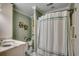 Clean bathroom with a walk-in shower and marble vanity at 153 Palmetto Harbour Dr., North Myrtle Beach, SC 29582