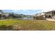 Serene waterfront view with charming homes and peaceful canal at 5001 N Ocean Blvd. # 2-I, North Myrtle Beach, SC 29582