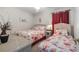 Guest bedroom with twin and double beds at 5001 N Ocean Blvd. # 2-I, North Myrtle Beach, SC 29582