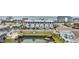 Aerial view of a coastal building near water, showing surrounding neighborhood and parking at 5001 N Ocean Blvd. # 2-I, North Myrtle Beach, SC 29582