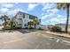 Spacious parking lot with easy access to the building at 5001 N Ocean Blvd. # 2-I, North Myrtle Beach, SC 29582