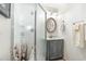 Clean bathroom with shower, vanity and linen storage at 5001 N Ocean Blvd. # 2-I, North Myrtle Beach, SC 29582
