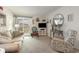Spacious living room with balcony access and coastal decor at 5001 N Ocean Blvd. # 2-I, North Myrtle Beach, SC 29582