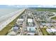 Aerial view showcasing a beachside community with ocean and marsh views at 5001 N Ocean Blvd. # 2-I, North Myrtle Beach, SC 29582