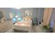 Bedroom with flamingo bedding and wicker furniture at 1048 Portico Loop # 1048, Myrtle Beach, SC 29577