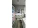 Bright bathroom with shower, white vanity, and beach-themed decor at 1048 Portico Loop # 1048, Myrtle Beach, SC 29577
