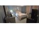 Bedroom with a queen-size bed and coastal decor at 1048 Portico Loop # 1048, Myrtle Beach, SC 29577