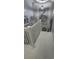 Upstairs hall with white railing and nautical wall art at 1048 Portico Loop # 1048, Myrtle Beach, SC 29577