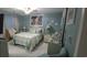 Guest bedroom with a queen bed and coastal decor at 1048 Portico Loop # 1048, Myrtle Beach, SC 29577