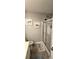 Bathroom with glass shower, gray walls, and coastal decor at 1048 Portico Loop # 1048, Myrtle Beach, SC 29577