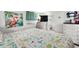 Main bedroom with a king-size bed, dresser, and beach theme at 6001 - M-58 S Kings Hwy., Myrtle Beach, SC 29575