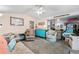 Living room with a comfortable seating area and a view to the kitchen at 6001 - M-58 S Kings Hwy., Myrtle Beach, SC 29575