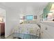 Main bedroom with a king-size bed and beach decor at 6001 - M-58 S Kings Hwy., Myrtle Beach, SC 29575