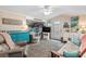 Living area with a sleeper sofa, bunk beds, and beach decor at 6001 - M-58 S Kings Hwy., Myrtle Beach, SC 29575