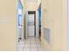 Stackable washer and dryer in convenient hallway at 472 River Oaks Dr. # 65C, Myrtle Beach, SC 29579