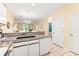 Condo kitchen with granite countertops and island with sink at 472 River Oaks Dr. # 65C, Myrtle Beach, SC 29579