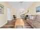 Open living room with view into kitchen and dining area at 472 River Oaks Dr. # 65C, Myrtle Beach, SC 29579