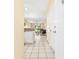 View of condo entryway, kitchen, and living room at 472 River Oaks Dr. # 65C, Myrtle Beach, SC 29579