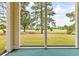Screened porch overlooking a golf course at 472 River Oaks Dr. # 65C, Myrtle Beach, SC 29579