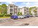 Brick building exterior with multiple levels and balconies at 472 River Oaks Dr. # 65C, Myrtle Beach, SC 29579