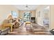 Relaxing living room featuring hardwood floors and sliding glass doors at 472 River Oaks Dr. # 65C, Myrtle Beach, SC 29579