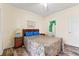 Bedroom with private bathroom access and wood floor at 472 River Oaks Dr. # 65C, Myrtle Beach, SC 29579