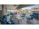 Spacious covered patio with comfortable seating and dining area at 6001 - Mh202 S Kings Hwy., Myrtle Beach, SC 29575