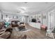 Relaxing living room featuring leather sofas and a built-in entertainment center at 6001 - Mh202 S Kings Hwy., Myrtle Beach, SC 29575