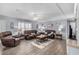 Living room featuring brown leather couches and a coffee table at 6001 - Mh202 S Kings Hwy., Myrtle Beach, SC 29575