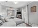 Bright bedroom with a comfortable bed and mirrored closet at 6001 - Mh202 S Kings Hwy., Myrtle Beach, SC 29575