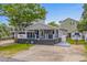 Single-story home with a large deck and a well-maintained yard at 6001 - Mh202 S Kings Hwy., Myrtle Beach, SC 29575