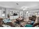 Open living room with hardwood floors and access to the kitchen at 6001 - Mh202 S Kings Hwy., Myrtle Beach, SC 29575