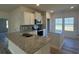 Modern kitchen with granite countertops and island at 4731 Huckleberry Ln., Conway, SC 29526